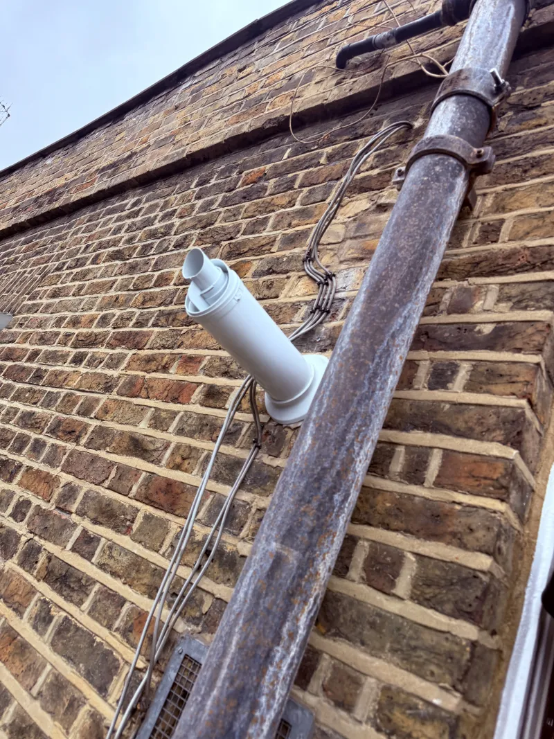 Boiler flue installation with core drilling near Holborn WC1N — Pristine Gas Ltd