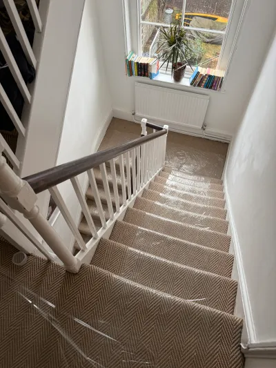 Worksite protected with foil sheeting ahead of designer radiator installation, St John's Wood NW8 — Pristine Gas Ltd
