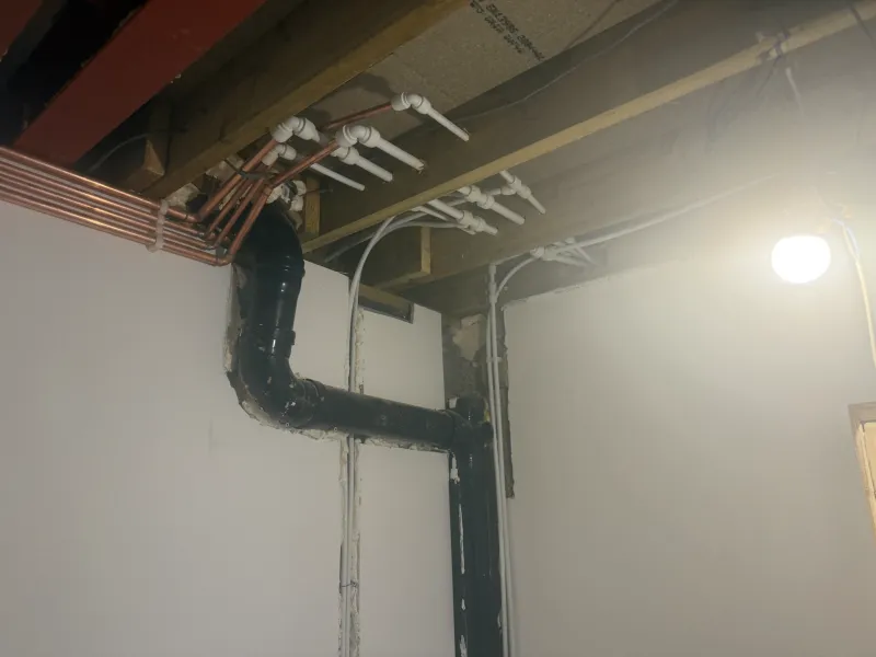 First-fix plumbing, soil stack and copper pipe distribution during a St Albans renovation — Pristine Gas Ltd