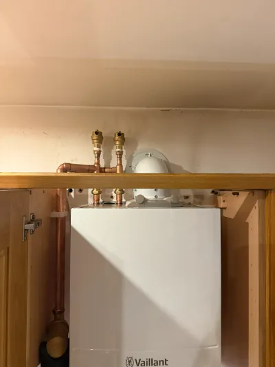 Vaillant boiler installed inside a kitchen wall cabinet in Borehamwood WD6 — Pristine Gas Ltd