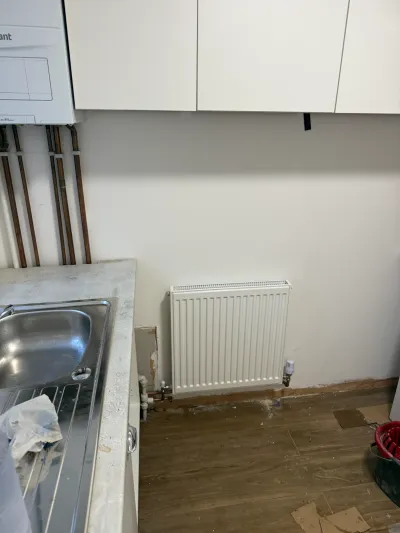 Anthracite vertical radiators installed and integrated into a Vaillant boiler system in St Albans — Pristine Gas Ltd