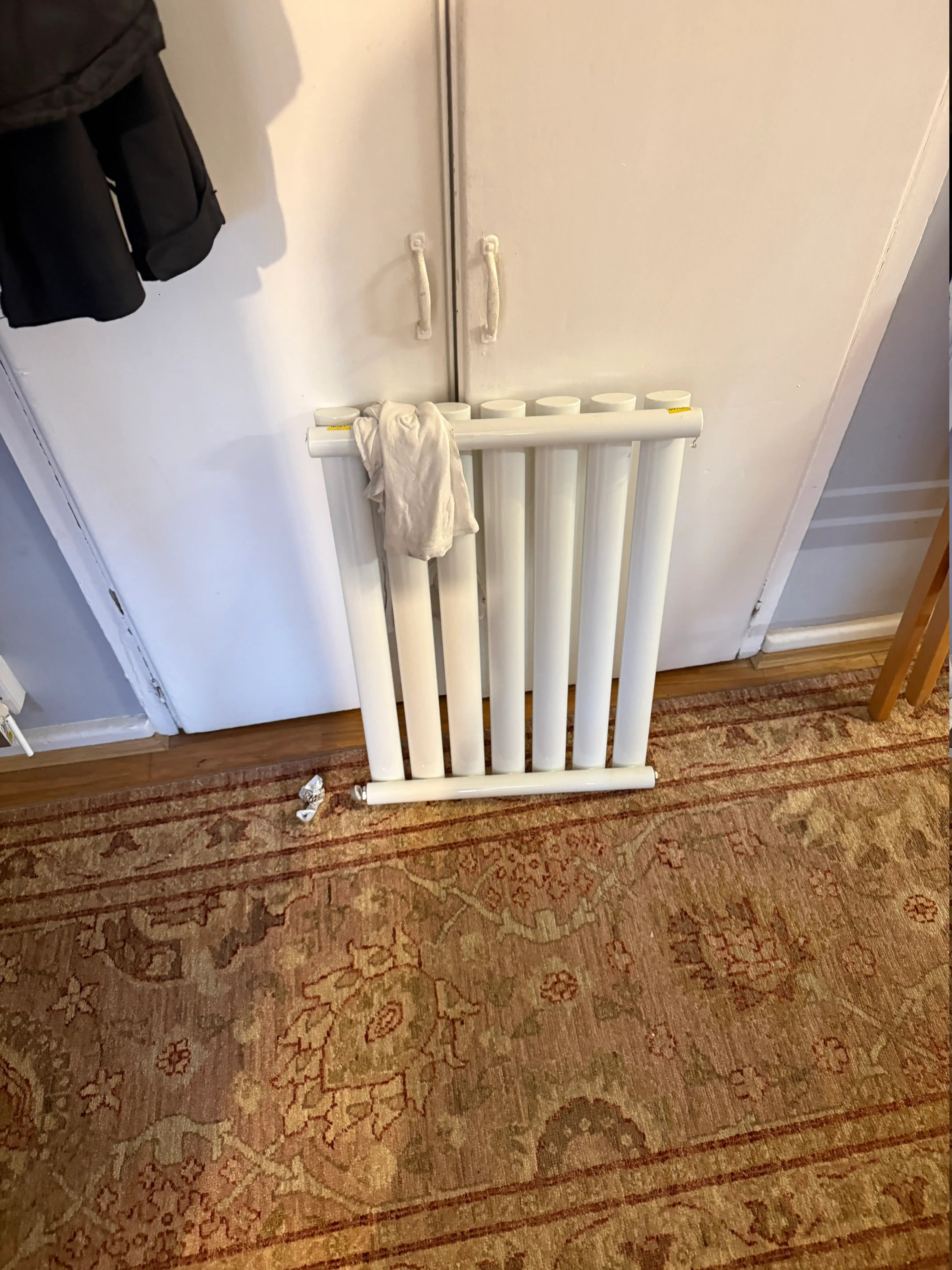 Designer column radiator being prepared for power flush in Kensal Town W10 — Pristine Gas Ltd