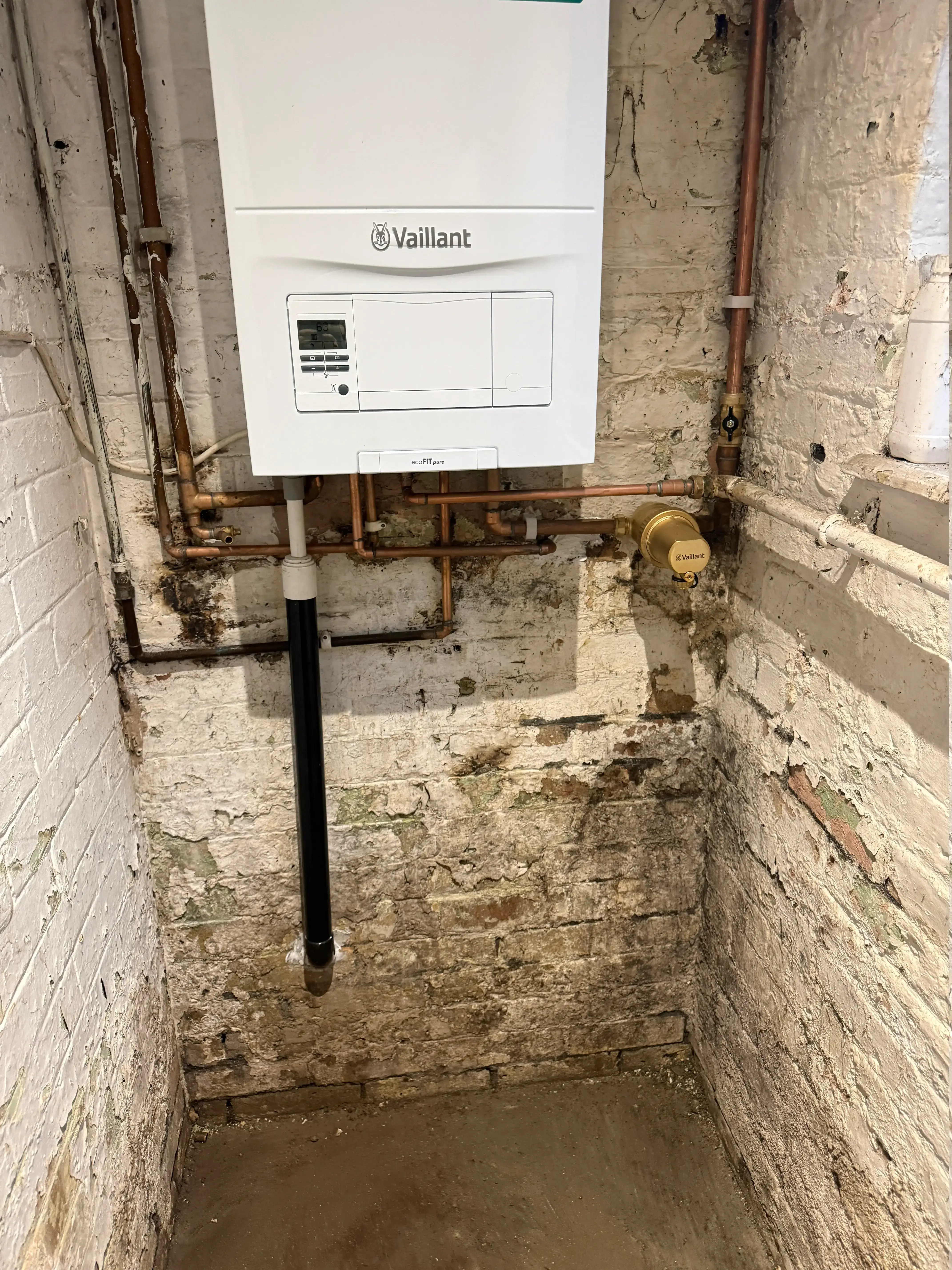 Vaillant ecoFIT pure boiler installed in residential cupboard in Fulham SW6 — Pristine Gas Ltd
